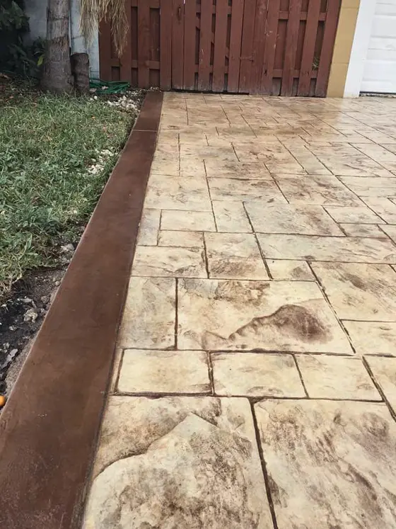 Stamped side yard in warm tones