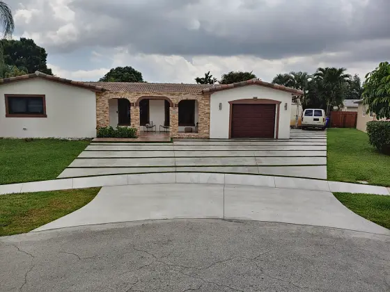 Long slab driveway with turf joints