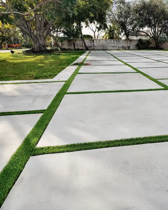 Wide slab driveway with diagonal turf joints