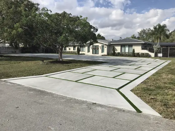 Angled slab driveway with turf joints