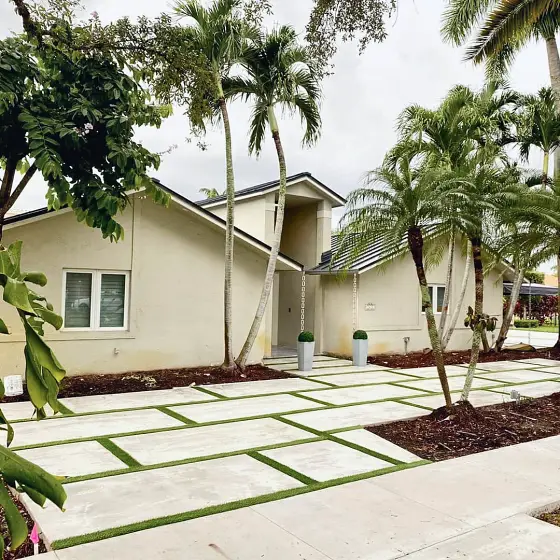 Slab driveway and walkway with turf joints