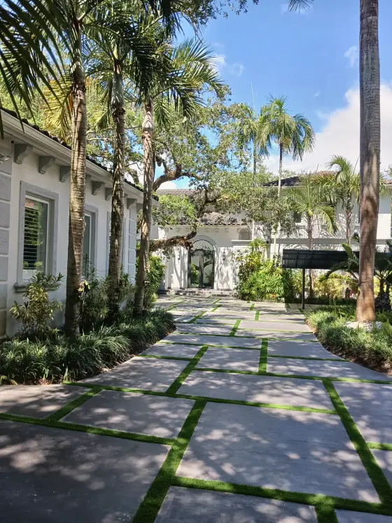 Entry walkway through a tropical garden